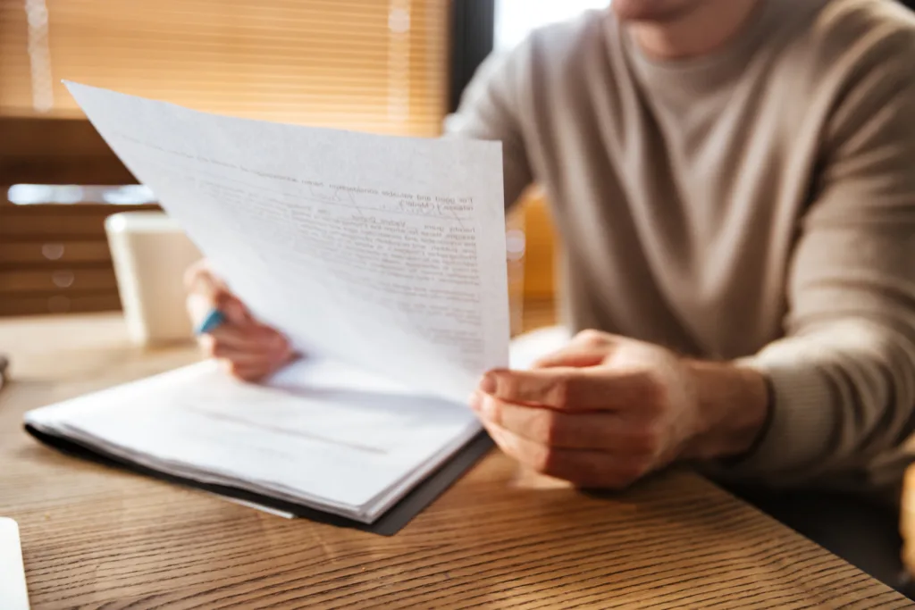 A client reviewing their probate paperwork from their attorney.